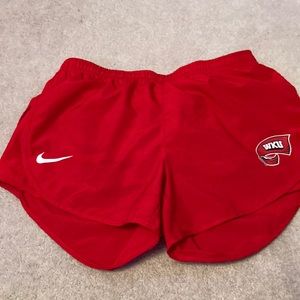 Red Nike shorts